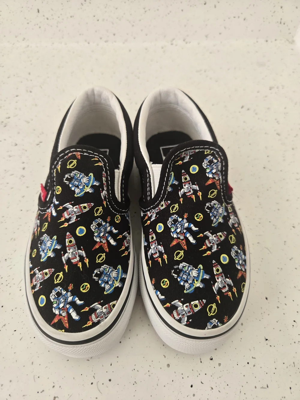 Vans Kids Slip-On Sneakers in Black with Multicolor Robot Print